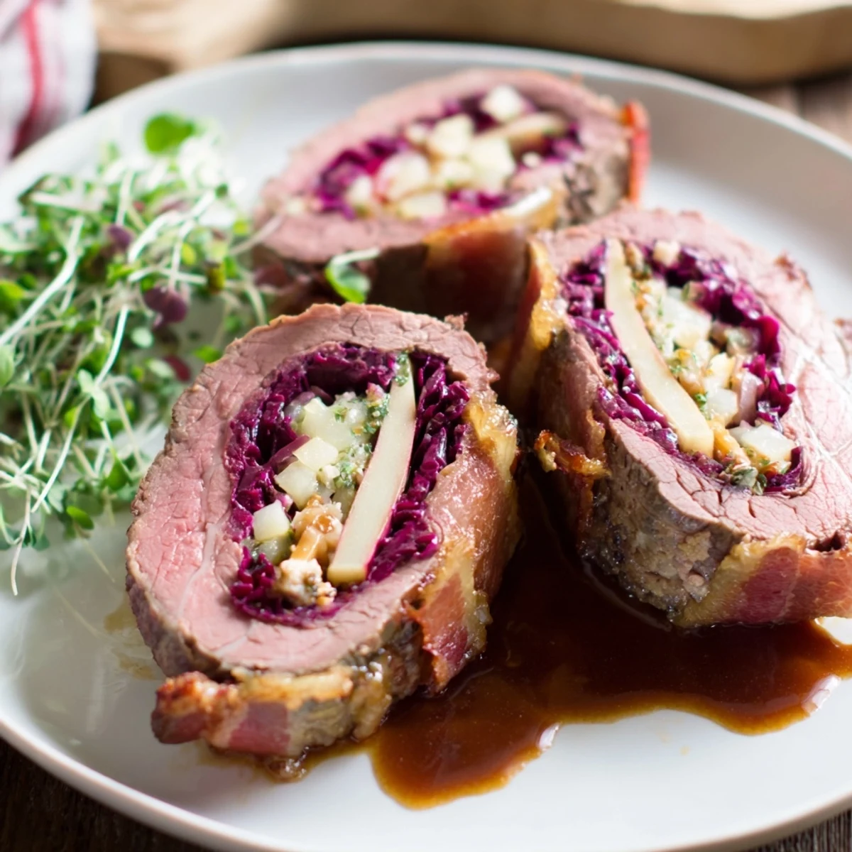 Close-up of Sauerbraten Roulades showing a plated dish with vibrant red cabbage twist.