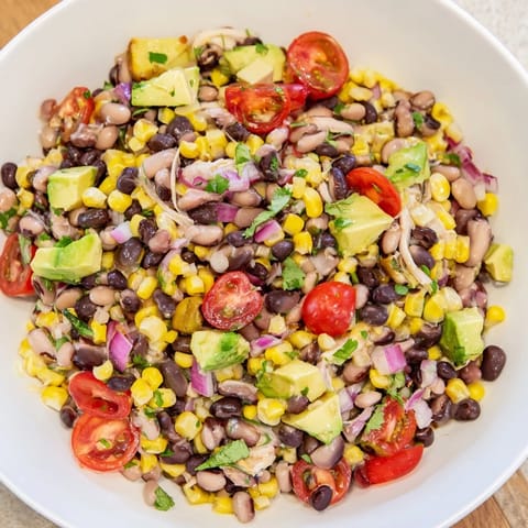 Close-up of a vibrant Dense Southwestern Bean Salad, perfect for a fresh and flavorful meal.