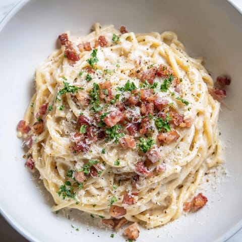 A quick and easy Ramen Carbonara Hack, featuring a rich egg and cheese sauce, ready in minutes.